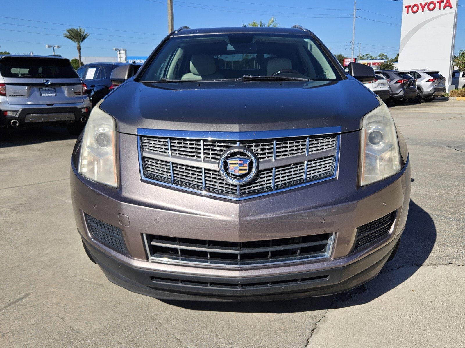 Used 2012 Cadillac SRX Luxury Collection with VIN 3GYFNAE37CS575577 for sale in Sebring, FL