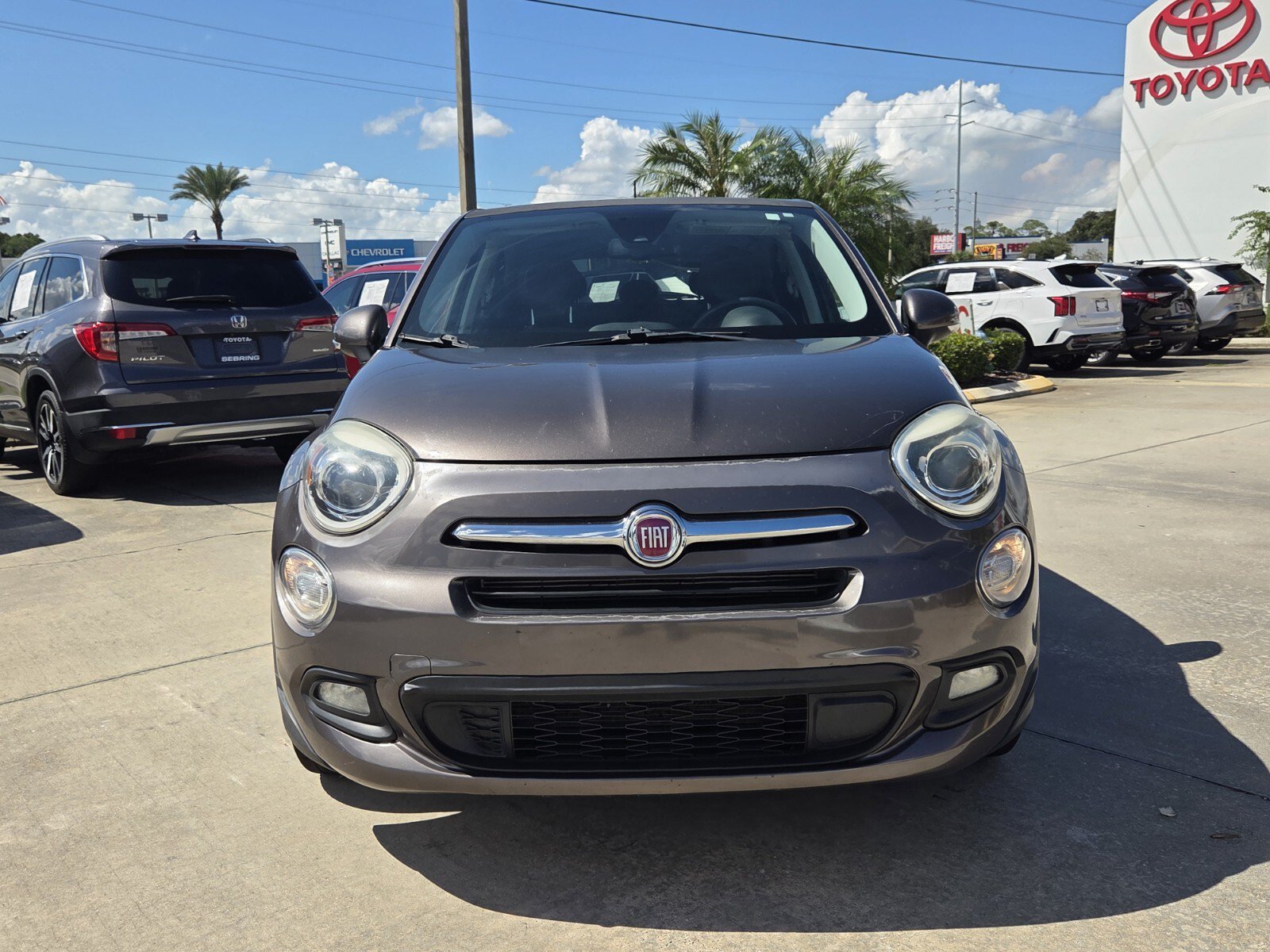 Used 2017 FIAT 500X Lounge with VIN ZFBCFXDB4HP568452 for sale in Sebring, FL