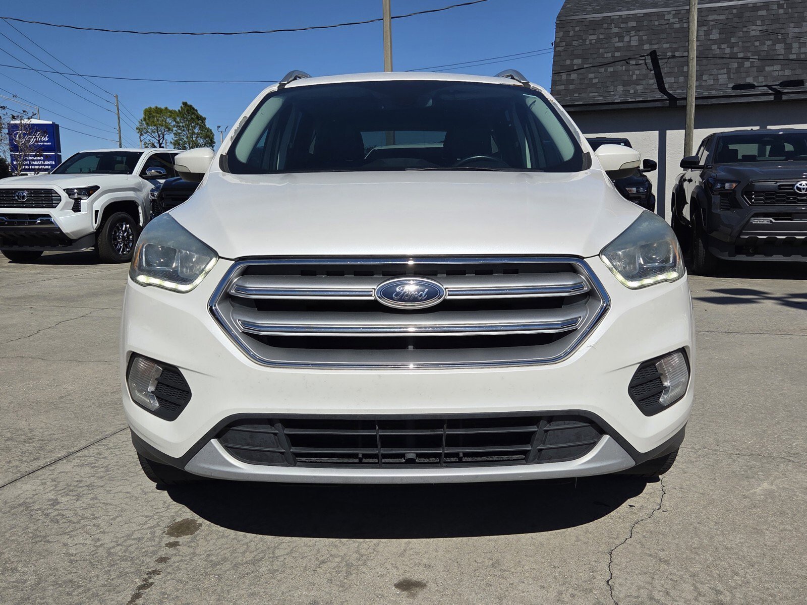 Used 2017 Ford Escape Titanium with VIN 1FMCU0JD7HUD58327 for sale in Sebring, FL