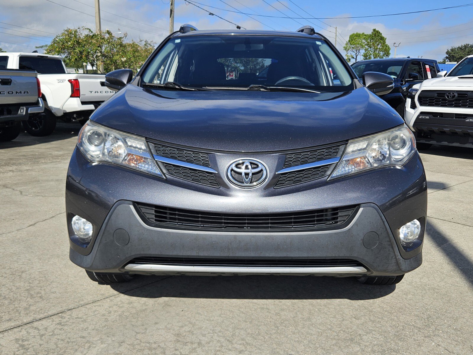 Used 2014 Toyota RAV4 XLE with VIN JTMWFREV1EJ013326 for sale in Sebring, FL