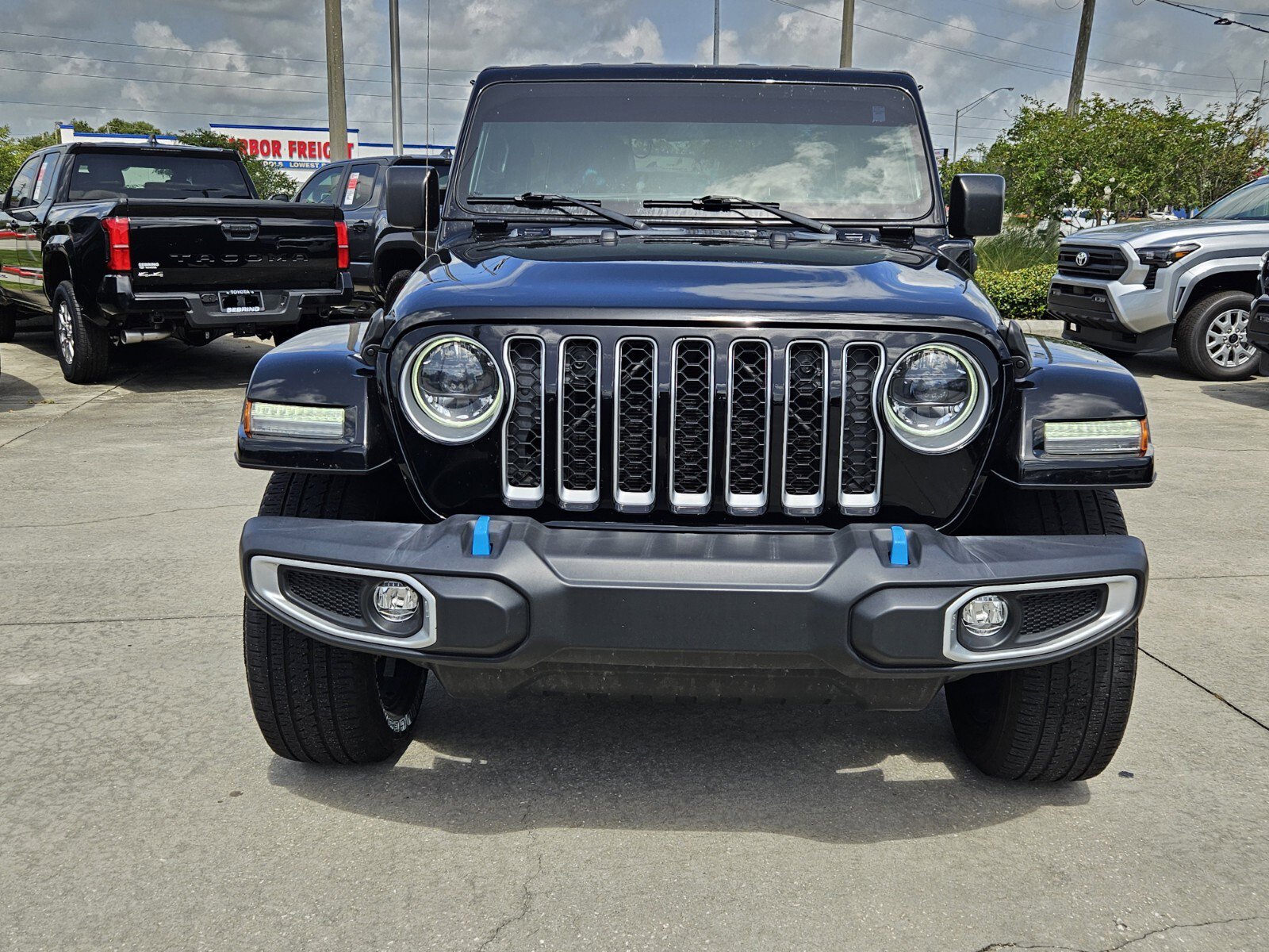 Used 2023 Jeep Wrangler 4xe Sahara 4XE with VIN 1C4JJXP64PW555108 for sale in Sebring, FL