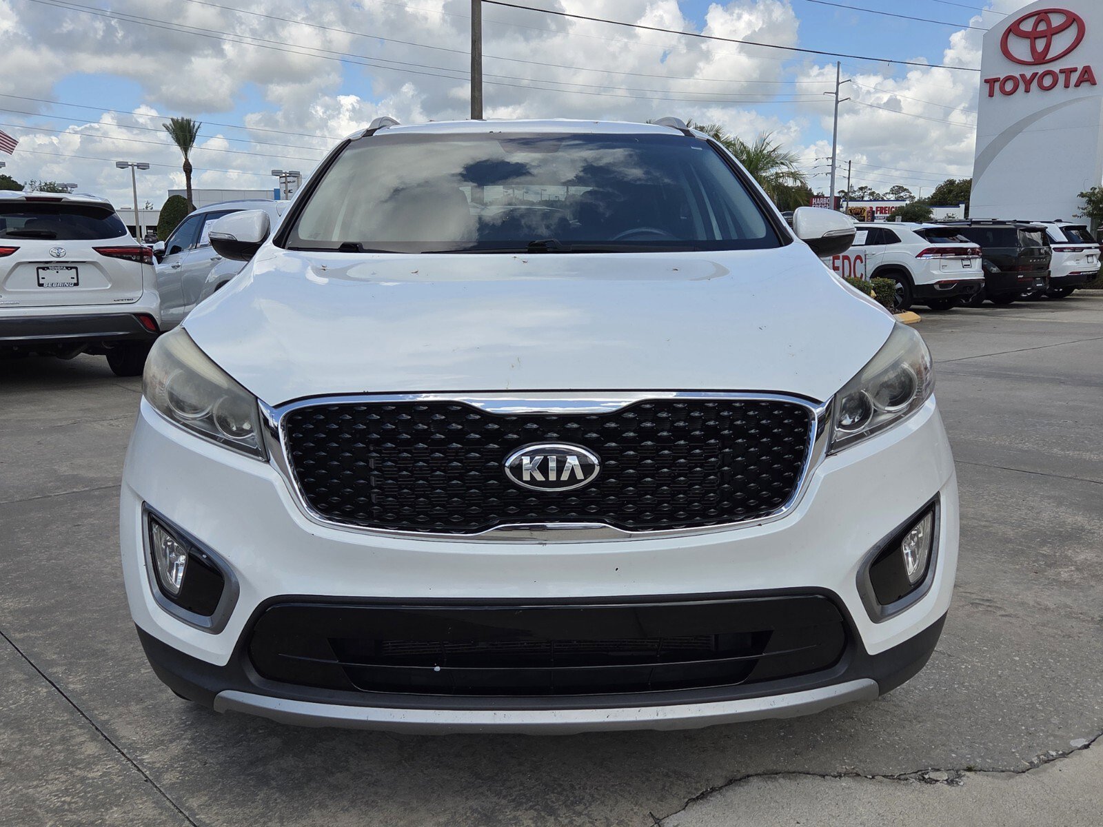 Used 2016 Kia Sorento EX with VIN 5XYPH4A55GG008642 for sale in Sebring, FL