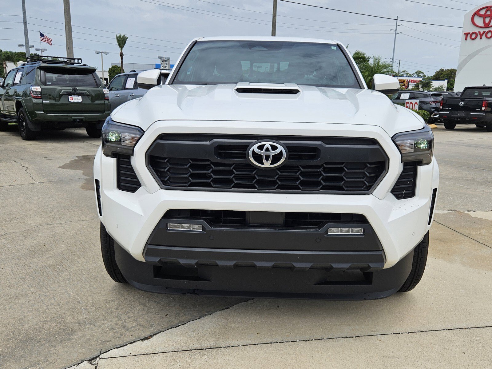 Used 2024 Toyota Tacoma TRD Sport with VIN 3TMKB5FN7RM001370 for sale in Sebring, FL