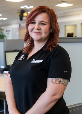 Staff member Amber Derbonne from 98b89bf7ceaa