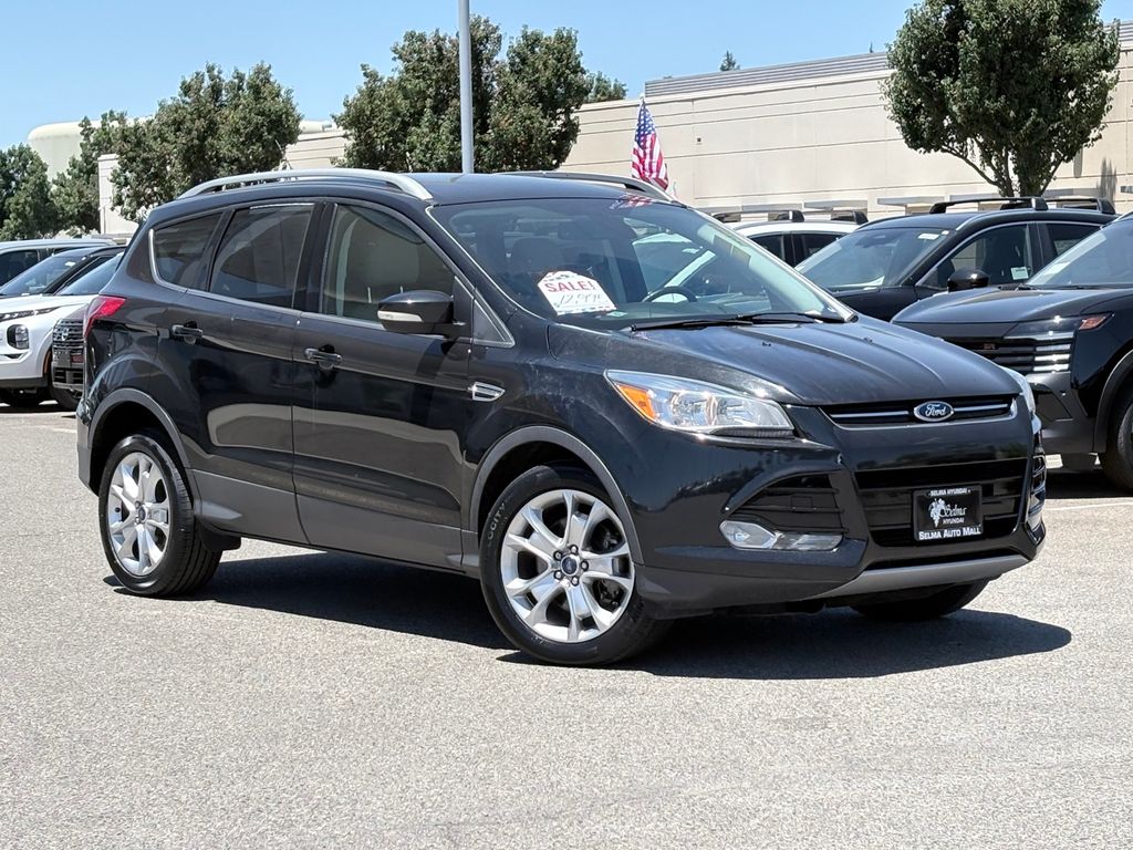 Used 2015 Ford Escape Titanium with VIN 1FMCU0J99FUA20484 for sale in Selma, CA