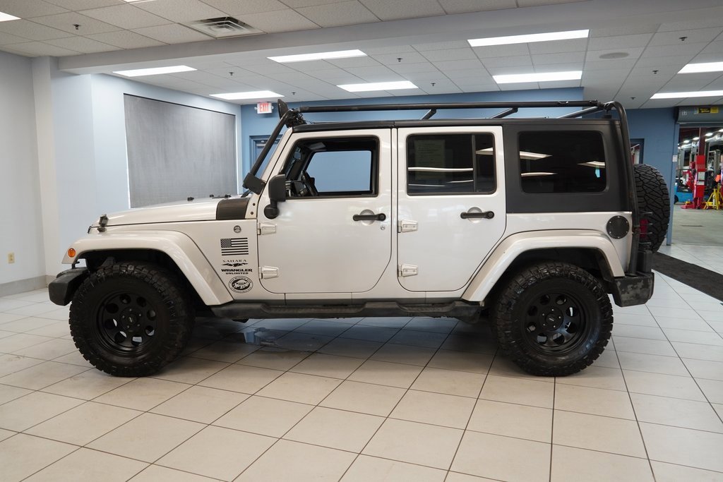 Used 2008 Jeep Wrangler Unlimited Sahara with VIN 1J4GA59148L642973 for sale in Strongsville, OH