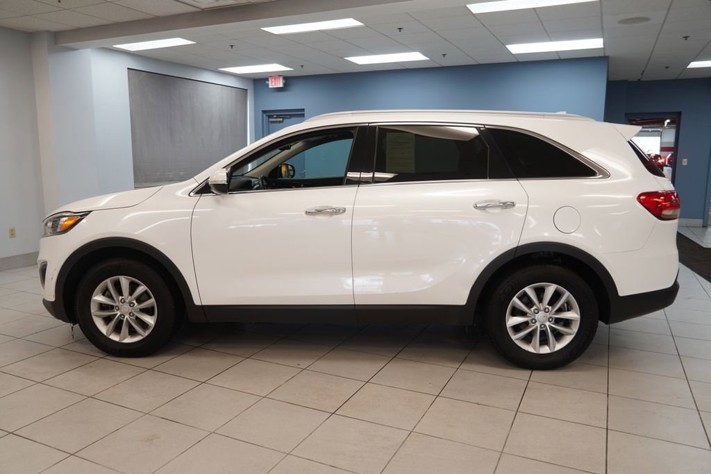 Used 2016 Kia Sorento LX with VIN 5XYPG4A3XGG128955 for sale in Strongsville, OH