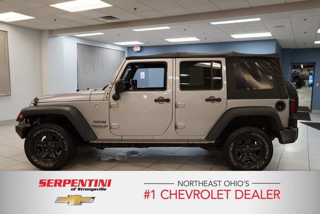 Used 2016 Jeep Wrangler Unlimited Sport with VIN 1C4BJWDG7GL138126 for sale in Strongsville, OH