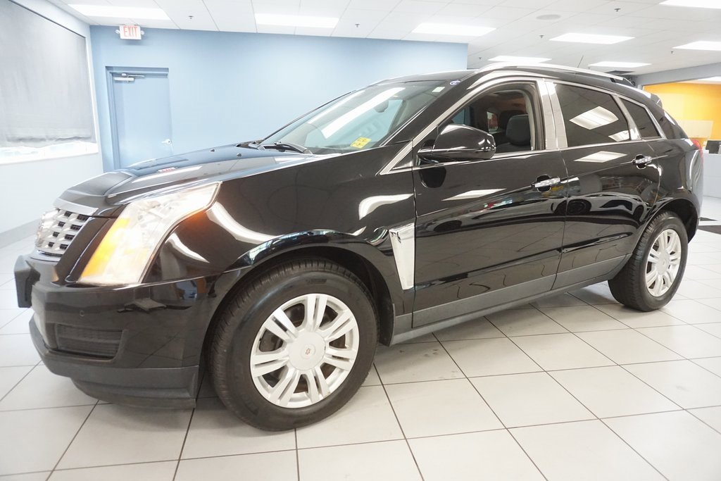 Used 2016 Cadillac SRX Luxury Collection with VIN 3GYFNEE33GS582135 for sale in Strongsville, OH