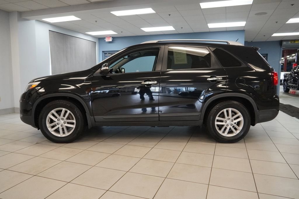 Used 2014 Kia Sorento LX with VIN 5XYKT4A64EG520391 for sale in Strongsville, OH