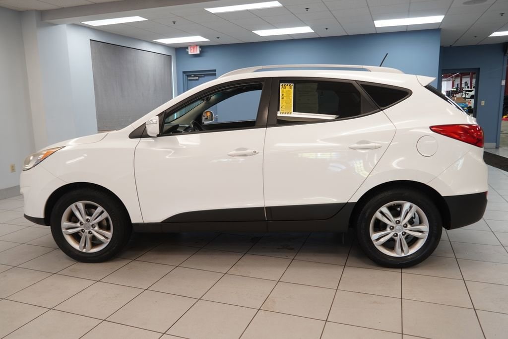 Used 2013 Hyundai Tucson GLS with VIN KM8JU3AC2DU752344 for sale in Strongsville, OH