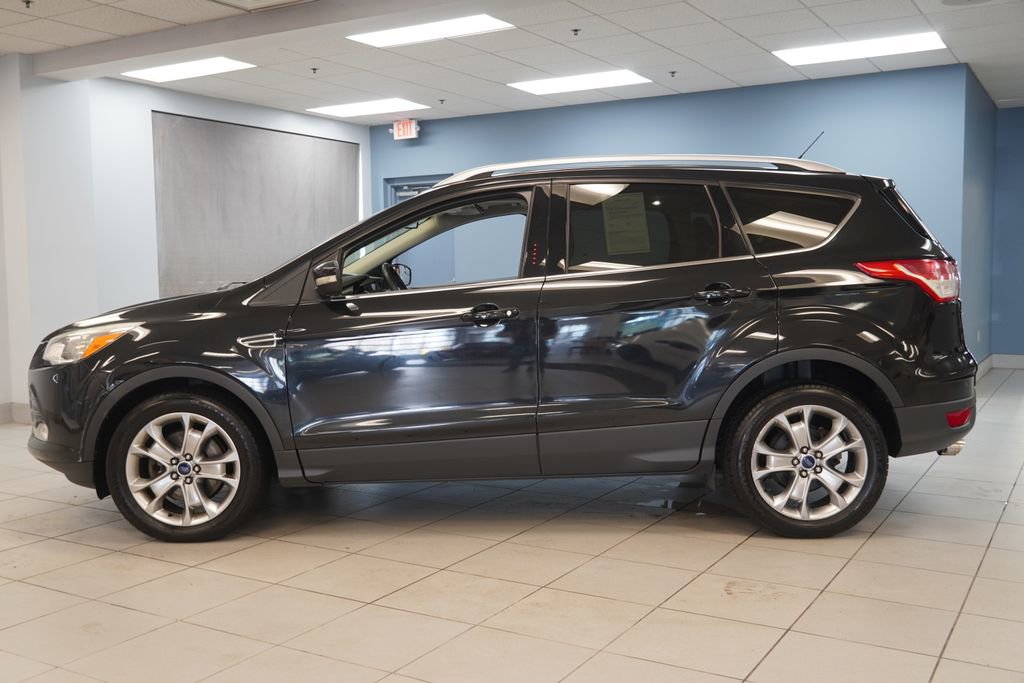 Used 2014 Ford Escape Titanium with VIN 1FMCU9JX6EUD99333 for sale in Strongsville, OH