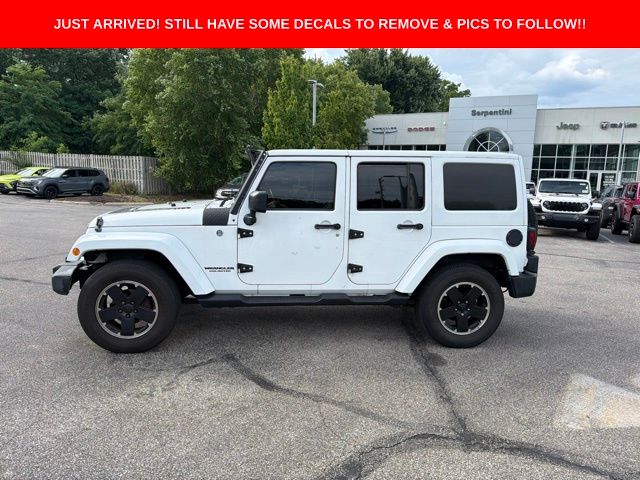 Used 2012 Jeep Wrangler Unlimited Altitude with VIN 1C4BJWEG3CL285407 for sale in North Olmsted, OH