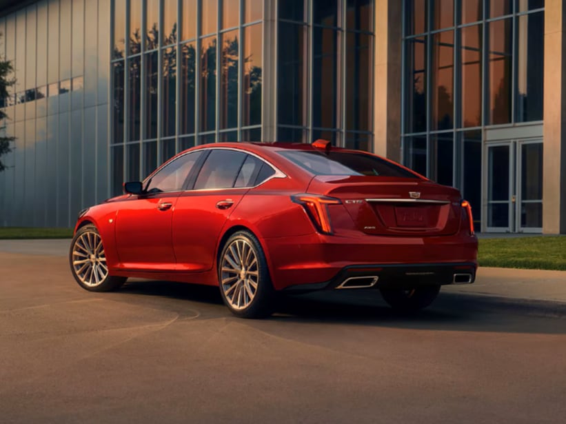  View from rear of 2026 Cadillac CT5 in Radiant Red Tintcoat