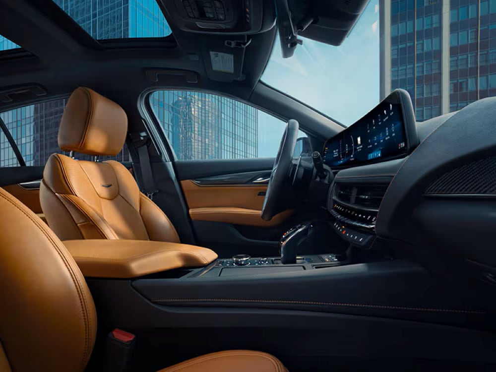  2026 Cadillac CT5 featuring interior ambient lighting and leather seating