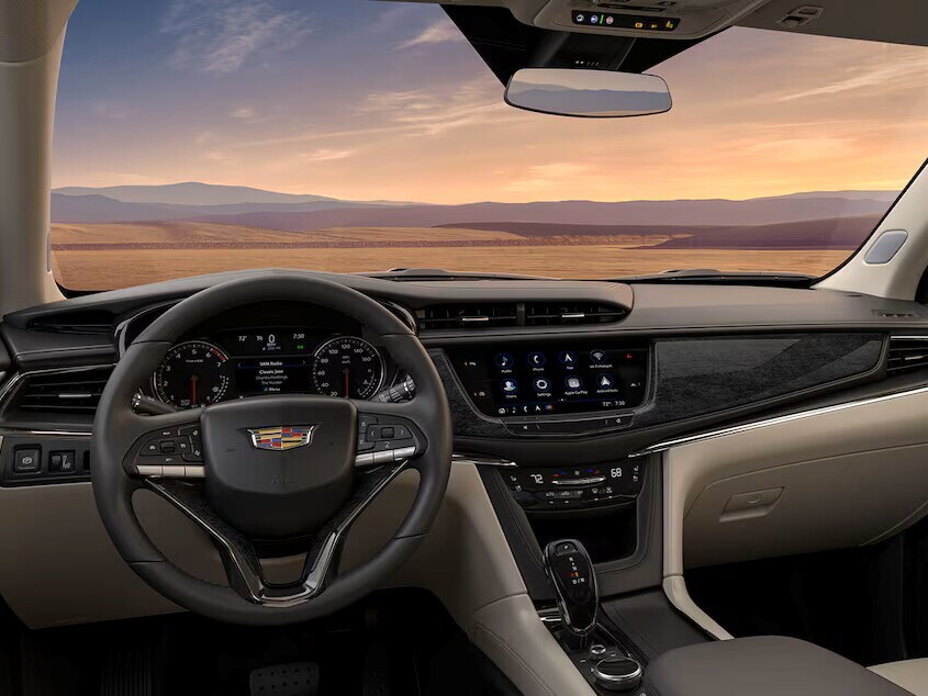 Driver Selecting V Driving Mode Inside the 2025 XT6