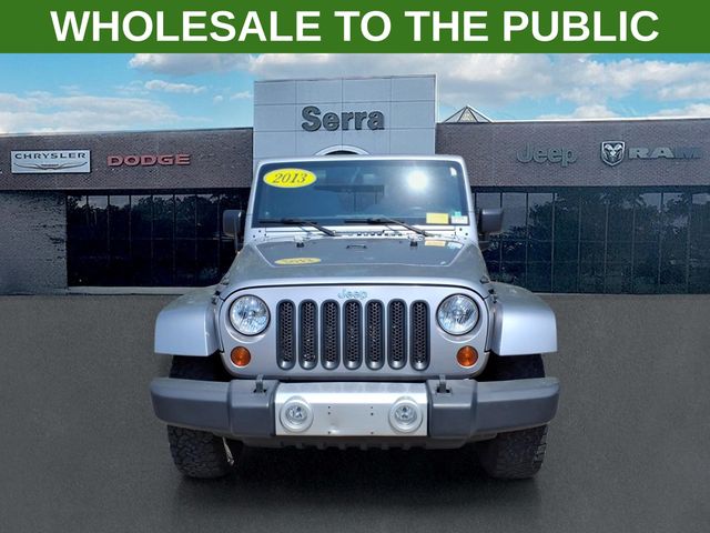 Used 2013 Jeep Wrangler Unlimited Sahara with VIN 1C4BJWEG9DL604472 for sale in Orion Township, MI