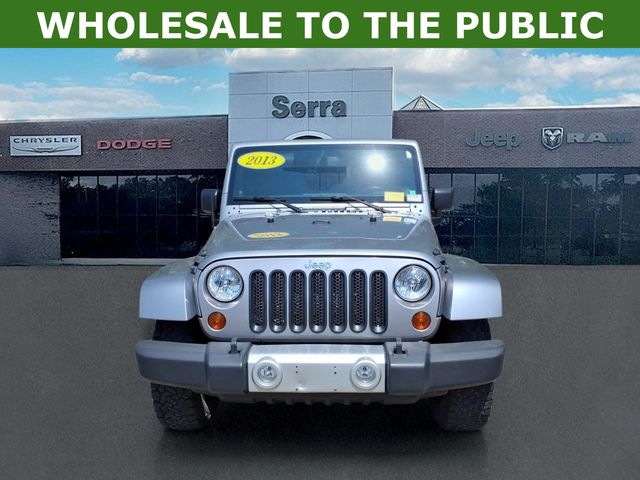 Used 2013 Jeep Wrangler Unlimited Sahara with VIN 1C4BJWEG9DL604472 for sale in Orion Township, MI