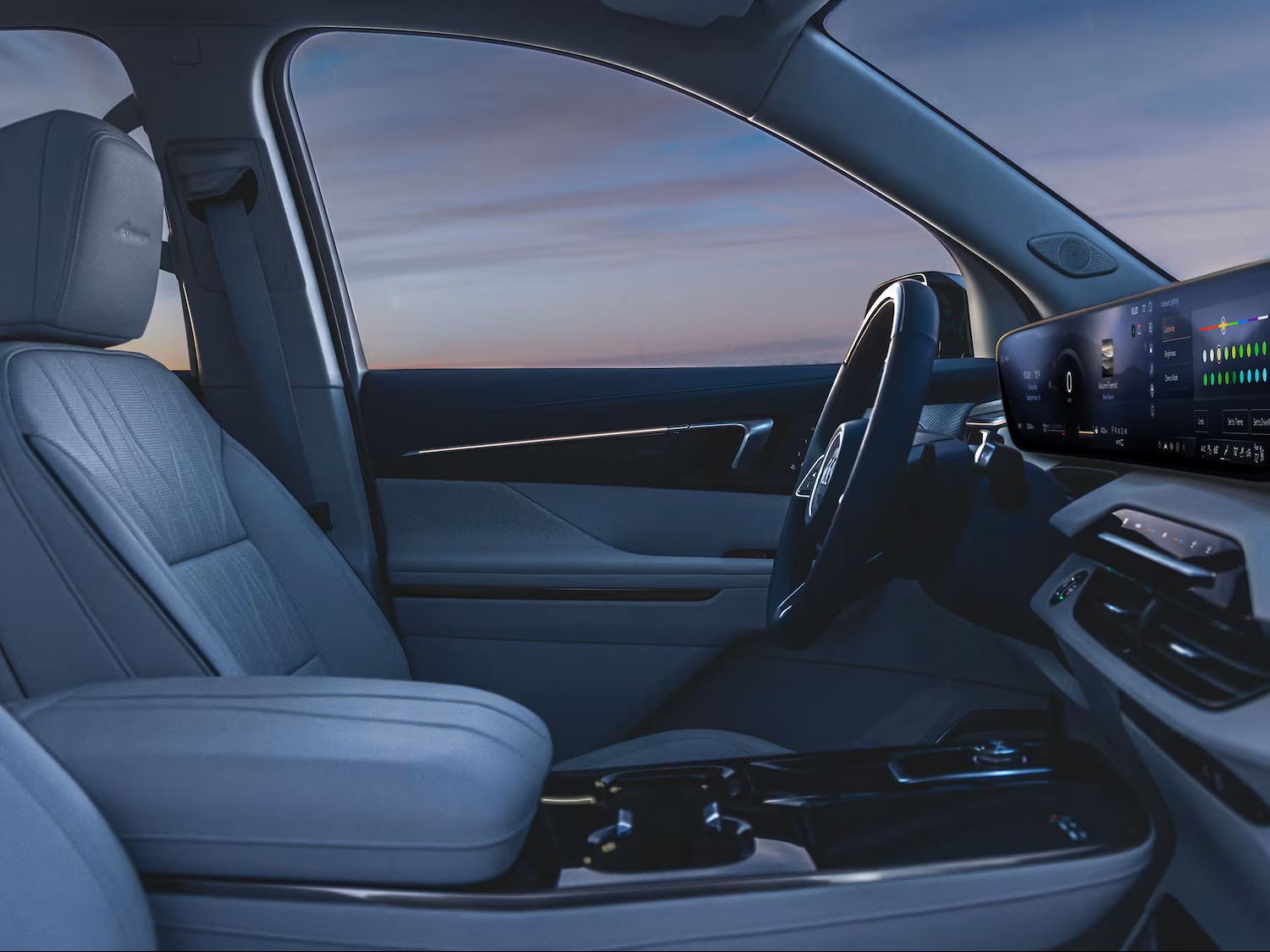 Front Passenger View of a Steering Wheel and Display Dashboard Inside the 2026 Buick Enclave Mid-Size SUV