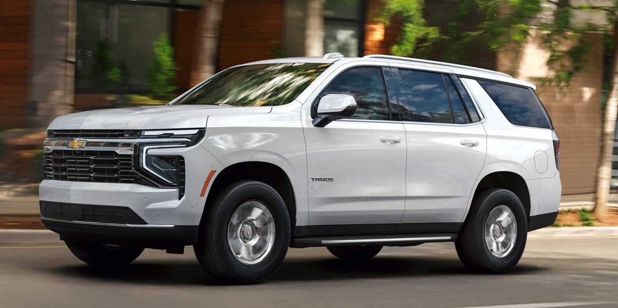  Elegant 2026 Tahoe in Summit White with 22 inch wheels and distrinct badging.jpg