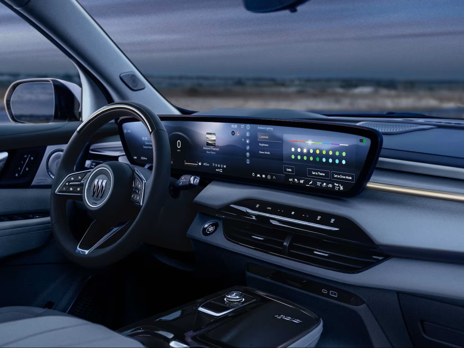 View of the Steering Wheel and Dashboard from the Front Passenger Seat of a 2026 Buick Enclave Mid-Size SUV