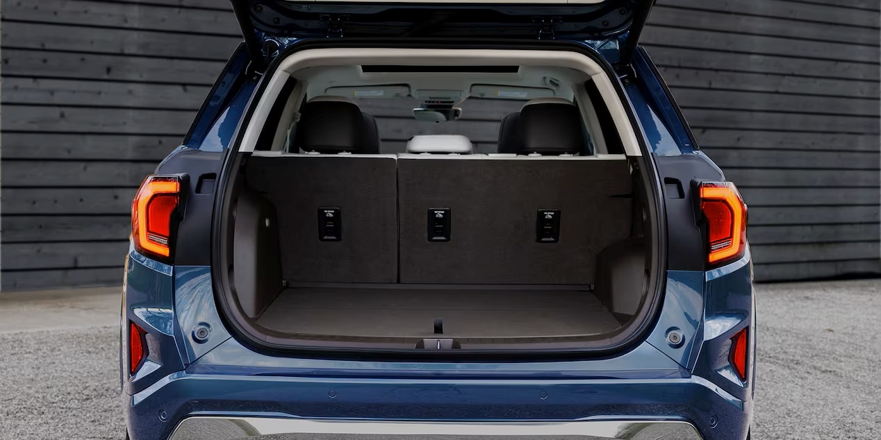  2026 GMC Terrain offers generous cargo space with 60/40 split-folding rear seats, underfloor storage, and a center console passthrough—engineered for everyday versatility and gear-heavy getaways.