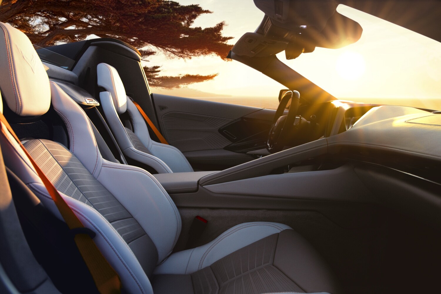 Corvette ZR1X interior at sunset with premium leather and bold orange seatbelts | Serra Chevrolet Buick GMC Nashville