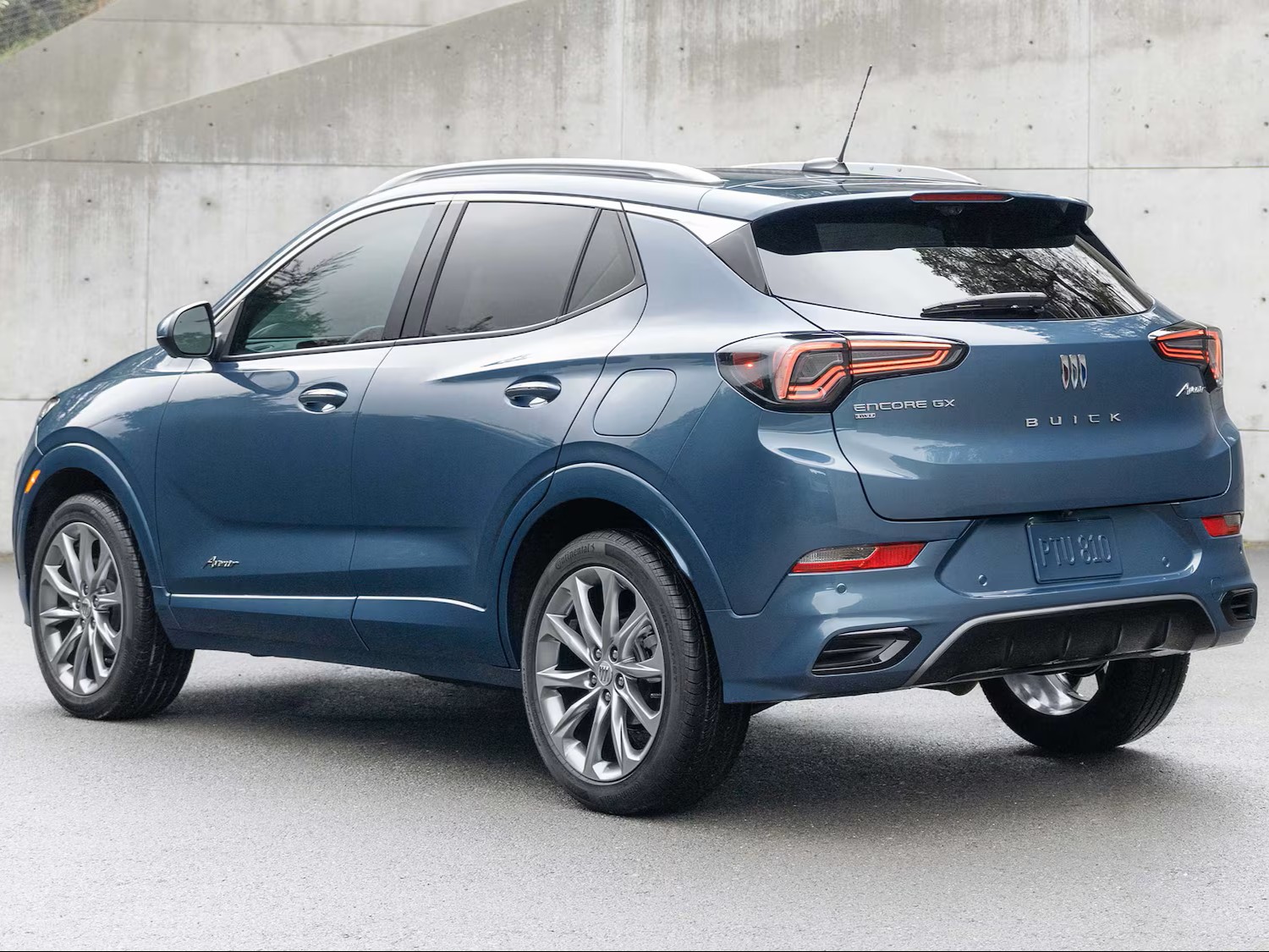 Rear Three-Quarters View of the 2026 Buick Encore GX Small SUV Parked in a Driveway