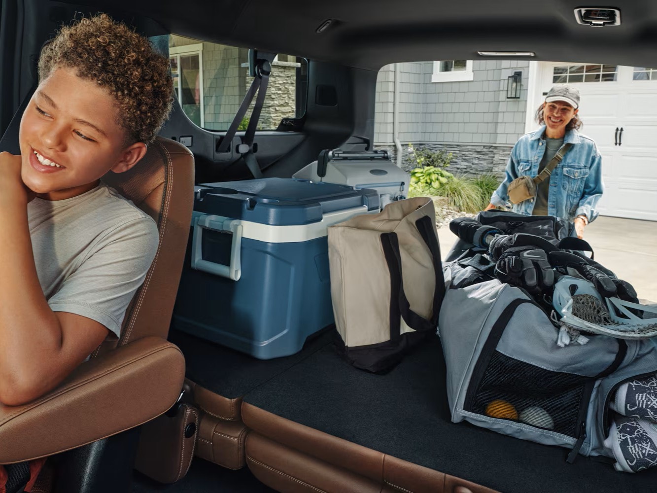  Inside view looking at 2026 Chevy Suburban with hands-free liftgate