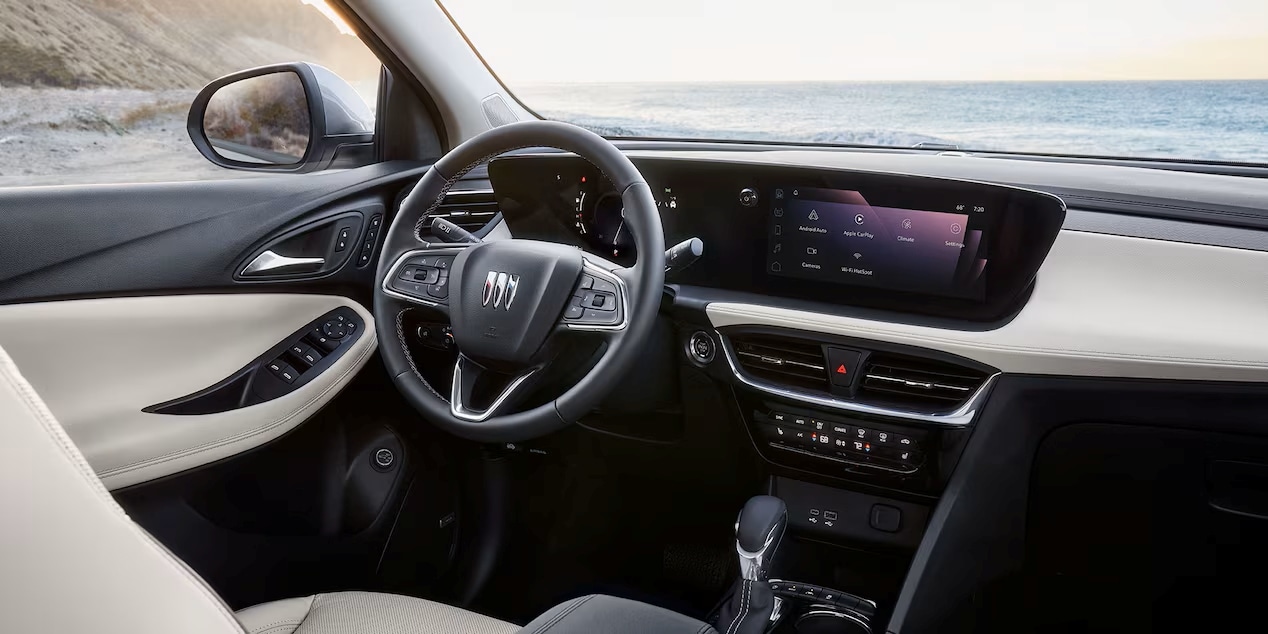 2026 Buick Encore GX Small SUV Light Interior Steering Wheel and Infotainment Screen at Serra Nashville