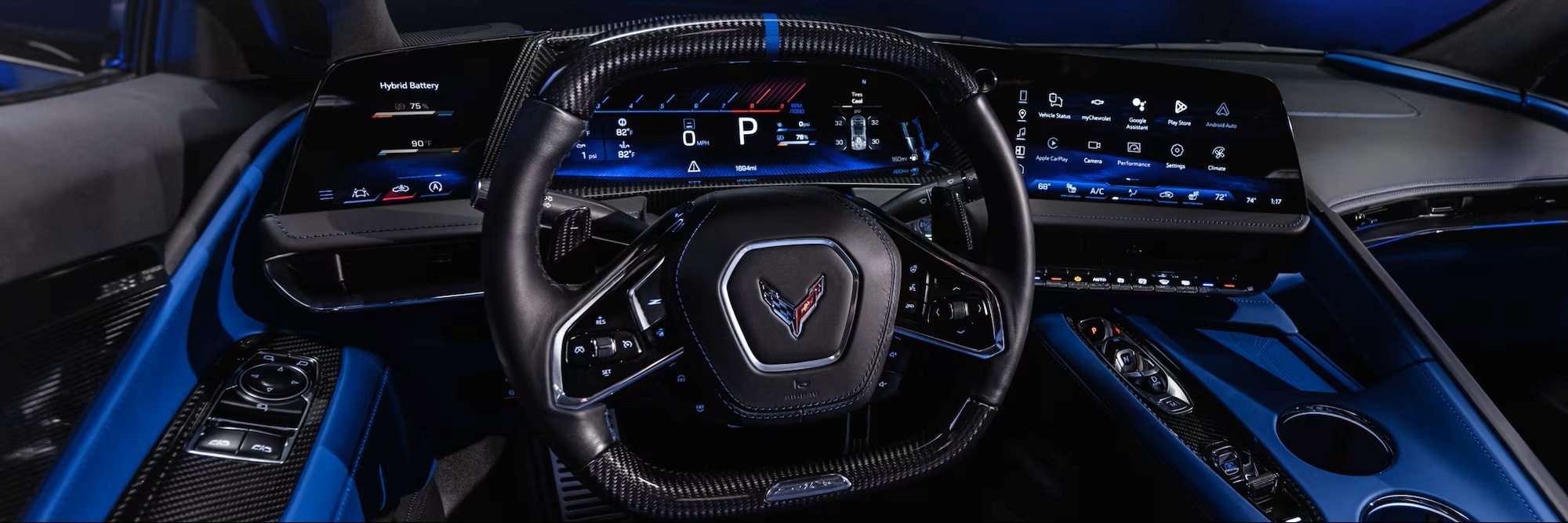 Driver’s seat view of ZR1X interior featuring GT2 sport seats, ambient lighting, and asymmetrical console layout