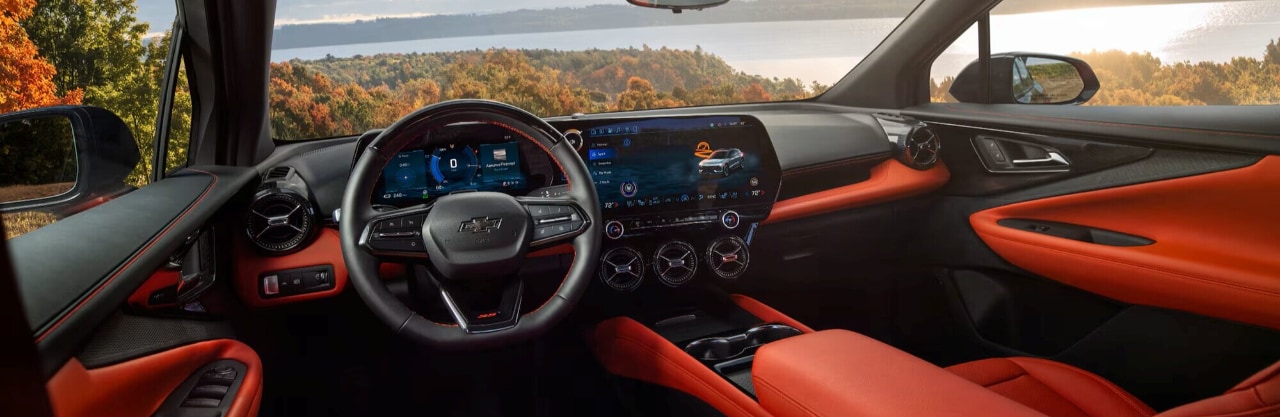 Center console with wireless charging pad and red-themed interface display-.jpg