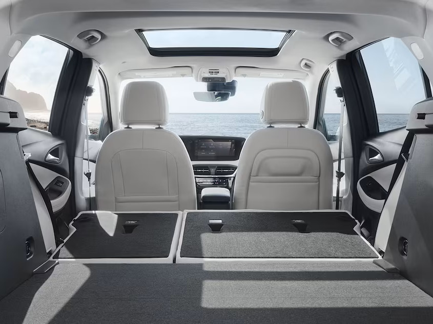 Interior View From the Rear of the Buick 2026 Encore GX Small SUV with the Rear Seats Folded Down
