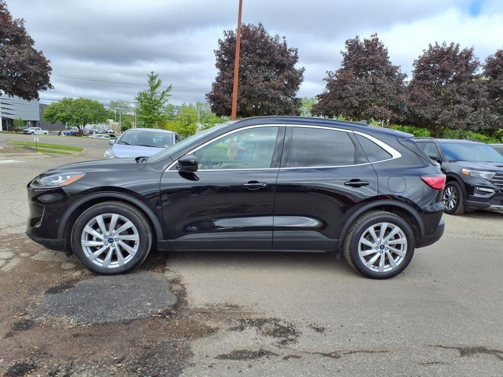 Used 2022 Ford Escape Titanium with VIN 1FMCU0DZ9NUA58579 for sale in Farmington, MI