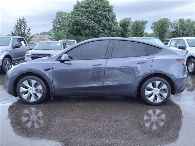 Used 2023 Tesla Model Y Long Range with VIN 7SAYGDEE2PF876559 for sale in Farmington, MI