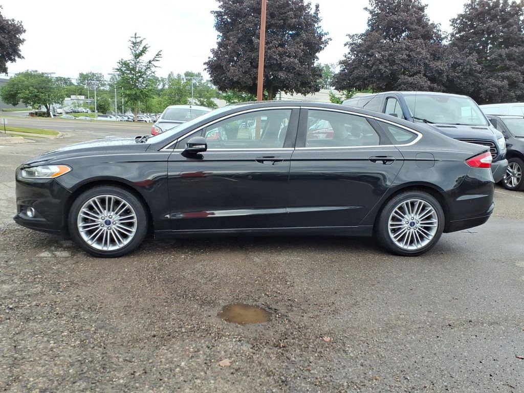 Used 2014 Ford Fusion SE with VIN 3FA6P0HD3ER267093 for sale in Farmington Hills, MI