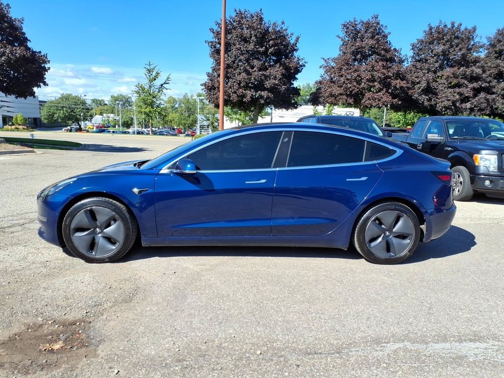 Used 2018 Tesla Model 3 Long Range Dual Motor with VIN 5YJ3E1EB6JF088604 for sale in Farmington Hills, MI