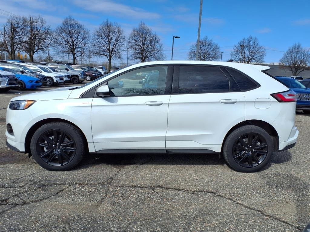 Used 2022 Ford Edge ST-Line with VIN 2FMPK4J95NBA43635 for sale in Farmington, MI