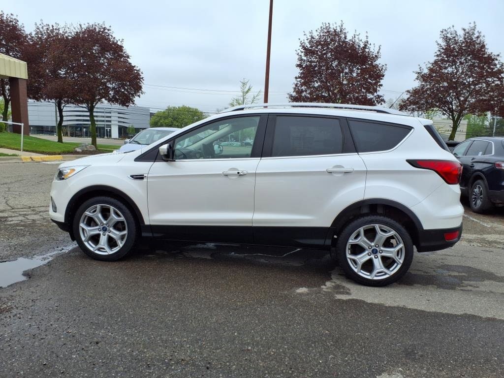 Used 2019 Ford Escape Titanium with VIN 1FMCU0J96KUC50994 for sale in Farmington, MI