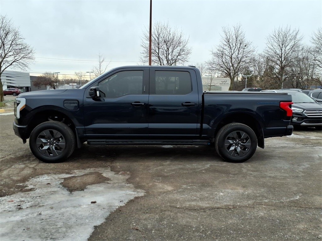 Used 2022 Ford F-150 Lightning Lariat with VIN 1FTVW1EL1NWG15450 for sale in Farmington Hills, MI