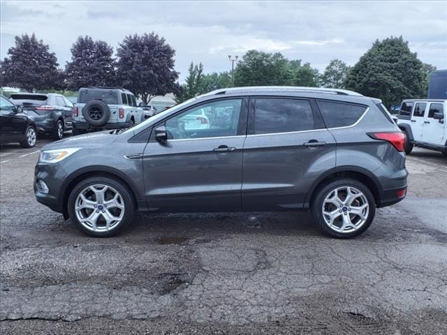 Used 2019 Ford Escape Titanium with VIN 1FMCU0J95KUA32562 for sale in Farmington, MI