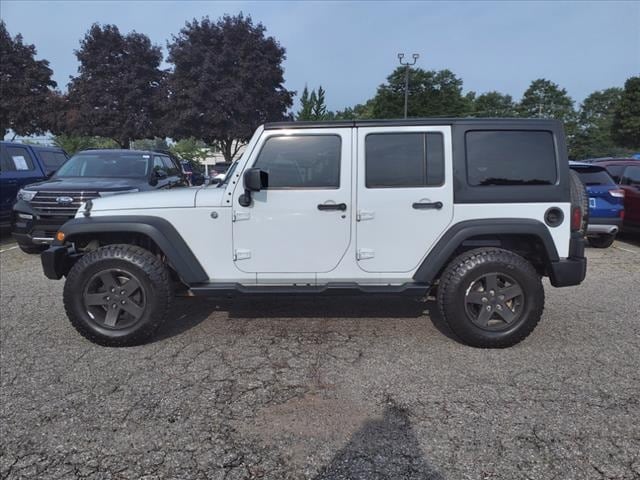 Used 2015 Jeep Wrangler Unlimited Sport with VIN 1C4BJWDG8FL682651 for sale in Farmington, MI