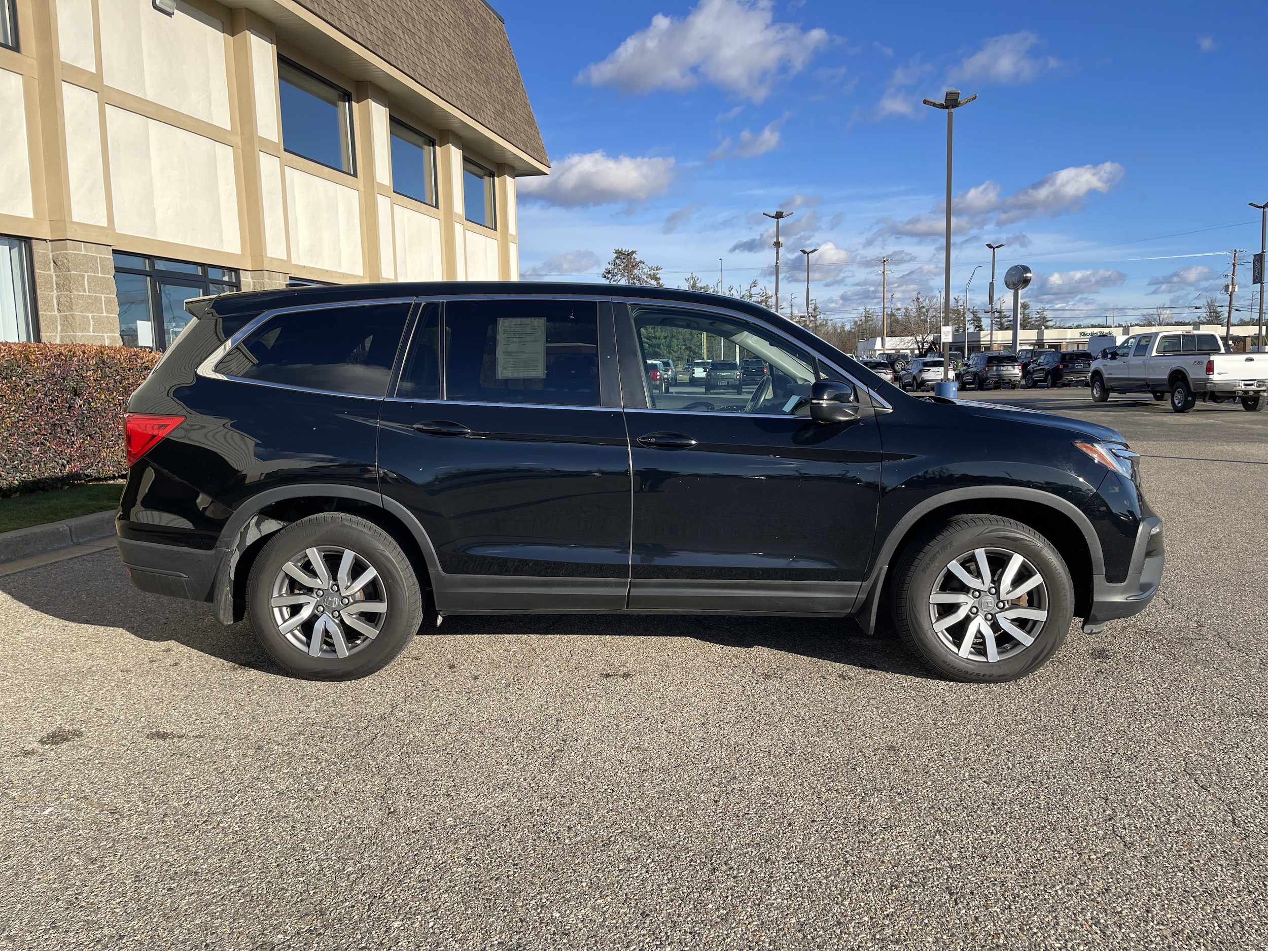 Used 2021 Honda Pilot EX-L with VIN 5FNYF6H5XMB051419 for sale in Gaylord, MI