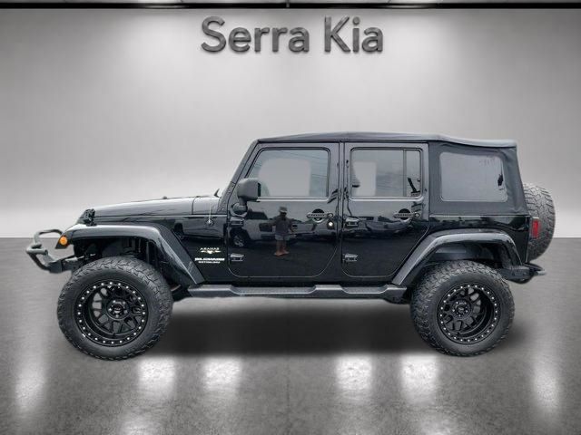 Used 2016 Jeep Wrangler Unlimited Sahara with VIN 1C4BJWEG5GL105057 for sale in Gardendale, AL