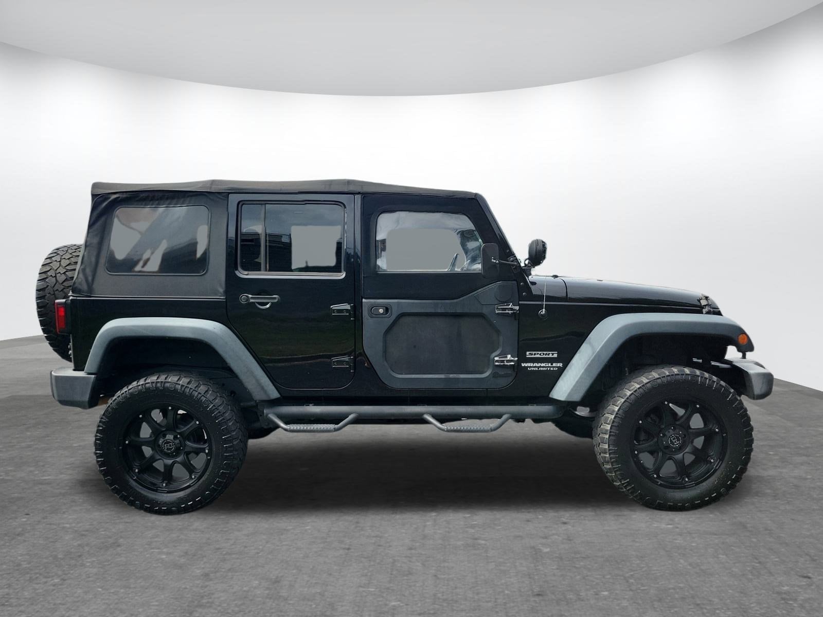 Used 2015 Jeep Wrangler Unlimited Sport with VIN 1C4BJWDG6FL763003 for sale in Gardendale, AL