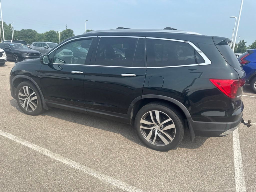 Used 2016 Honda Pilot Touring with VIN 5FNYF6H91GB029297 for sale in Grandville, MI