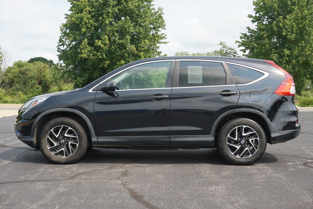Used 2016 Honda CR-V SE with VIN 5J6RM4H49GL081299 for sale in Grandville, MI