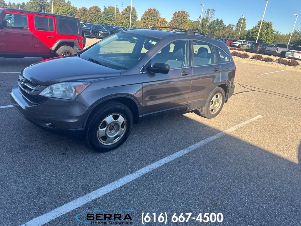 Used 2011 Honda CR-V LX with VIN 5J6RE4H34BL028801 for sale in Grandville, MI