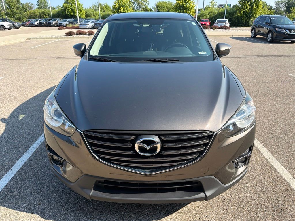 Used 2016 Mazda CX-5 Grand Touring with VIN JM3KE4DY8G0808065 for sale in Grandville, MI