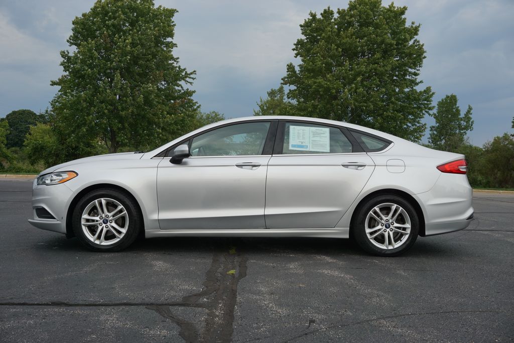 Used 2018 Ford Fusion SE with VIN 3FA6P0HD2JR211270 for sale in Grandville, MI